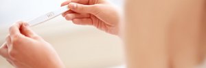 Woman Holding Pregnancy Test